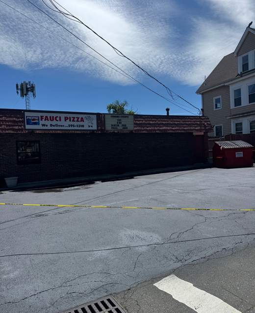 Freshly maintained asphalt parking lot